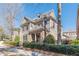 Charming two-story home featuring stone accents and a manicured front yard at 3529 S Sherwood Se Rd, Smyrna, GA 30082