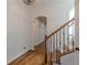 Bright hallway with hardwood floors and access to additional rooms at 3529 S Sherwood Se Rd, Smyrna, GA 30082