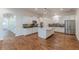 Well-appointed kitchen with white cabinetry, stainless steel appliances, and a stylish center island at 3529 S Sherwood Se Rd, Smyrna, GA 30082