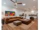 Open living space featuring hardwood floors, a comfortable seating area, and a modern kitchen at 3529 S Sherwood Se Rd, Smyrna, GA 30082