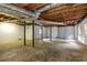 Unfinished basement with exposed duct work and concrete floor, ready for customization and storage at 616 Rich Davis Rd, Hiram, GA 30141