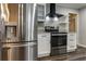 Modern kitchen featuring stainless steel appliances and ample counter space, perfect for culinary enthusiasts at 616 Rich Davis Rd, Hiram, GA 30141