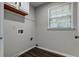 Utility room featuring wood-look floors and a window at 616 Rich Davis Rd, Hiram, GA 30141