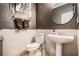 Stylish powder room featuring modern fixtures and decorative accents at 3647 Little Spg, Stockbridge, GA 30281
