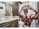 This bathroom features a shower/tub combo, custom vanity, and decorative shower curtain at 3647 Little Spg, Stockbridge, GA 30281