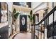 Elegant foyer with dark trim, wood floors, and modern lighting at 3647 Little Spg, Stockbridge, GA 30281