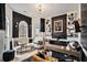 Stylish home office with custom shelving, modern decor, and comfortable seating at 3647 Little Spg, Stockbridge, GA 30281