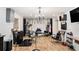 Salon space featuring chairs, chandelier, reception desk, and styling stations at 3647 Little Spg, Stockbridge, GA 30281