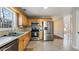 Efficient kitchen with stainless steel appliances and a view of the breakfast area. Open concept floorplan at 4146 Mcever Park Dr, Acworth, GA 30101