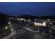 Night view of the railroad crossing and train station, displaying street lighting and city infrastructure at 4146 Mcever Park Dr, Acworth, GA 30101