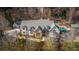 Expansive property featuring luxurious home, swimming pool, multiple garages and beautifully landscaped grounds at 4755 Columns Se Dr, Marietta, GA 30067