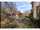 Serene backyard featuring a pool, cabana, wrought iron fence and a beautiful green space at 4755 Columns Se Dr, Marietta, GA 30067