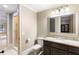 Bathroom featuring a toilet, vanity with a granite countertop, and a shower at 4755 Columns Se Dr, Marietta, GA 30067