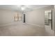 Carpeted bedroom featuring neutral walls, crown molding, and closet at 4755 Columns Se Dr, Marietta, GA 30067