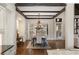 Elegant dining room featuring a coffered ceiling and hardwood floors at 4755 Columns Se Dr, Marietta, GA 30067
