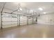 Spacious three-car garage with epoxy flooring and automatic door openers, providing ample parking and storage at 4755 Columns Se Dr, Marietta, GA 30067