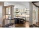 Bright kitchen featuring an island with granite counters and stainless appliances at 4755 Columns Se Dr, Marietta, GA 30067