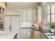 Bright kitchen with stainless steel appliances, stone countertops, and built-in refrigerator at 4755 Columns Se Dr, Marietta, GA 30067