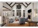 Spacious living room with high ceilings, fireplace, and large windows offering natural light at 4755 Columns Se Dr, Marietta, GA 30067