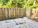 Fenced backyard and patio featuring a wood privacy fence and stone tile at 2147 Palmyra Se Dr, Marietta, GA 30067