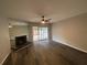 Spacious living room featuring a brick fireplace and sliding glass doors to the exterior at 2147 Palmyra Se Dr, Marietta, GA 30067