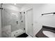 Modern bathroom with a glass walk-in shower, sleek fixtures and a dark countertop at 3208 Sonnet Se Walk, Atlanta, GA 30339