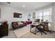 Comfortable living room with a gray sofa, workspace and an attached bedroom, perfect for relaxing and working at 3208 Sonnet Se Walk, Atlanta, GA 30339