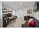Comfortable office with a gray sofa, workspace and lots of lighting, perfect for relaxing and working at 3208 Sonnet Se Walk, Atlanta, GA 30339