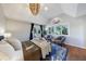 Light and airy bedroom featuring a large window, a vaulted ceiling, and hardwood floors at 3491 Roswell Ne Rd, Atlanta, GA 30305