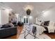 Elegant main bedroom with a fireplace, sitting area, and access to a balcony at 3491 Roswell Ne Rd, Atlanta, GA 30305