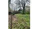 View of a large overgrown backyard with unkempt vegetation at 1771 Hosea L Williams Se Dr, Atlanta, GA 30317