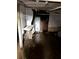 Flooded basement with exposed pipes and unfinished walls requires immediate attention and repair at 1771 Hosea L Williams Se Dr, Atlanta, GA 30317
