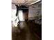 Flooded basement featuring support columns, exposed piping, and water heater at 1771 Hosea L Williams Se Dr, Atlanta, GA 30317