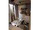 Interior view of a bathroom with a sink and toilet surrounded by damage and debris at 1771 Hosea L Williams Se Dr, Atlanta, GA 30317