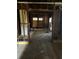 Interior of a home under renovation, showing exposed studs and unfinished flooring at 1771 Hosea L Williams Se Dr, Atlanta, GA 30317