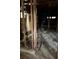 Interior shot of a gutted home with visible studs, damaged floors, and missing walls and ceiling at 1771 Hosea L Williams Se Dr, Atlanta, GA 30317