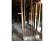 Interior view of a partially-demolished room with exposed framing, wooden beams and floor at 1771 Hosea L Williams Se Dr, Atlanta, GA 30317