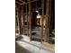 Interior view of a living room renovation with exposed studs and an open floor plan at 1771 Hosea L Williams Se Dr, Atlanta, GA 30317