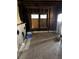 Interior view of a living room renovation with a vintage fireplace and natural light at 1771 Hosea L Williams Se Dr, Atlanta, GA 30317
