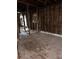 Interior view of a living room renovation with exposed studs and original wood flooring at 1771 Hosea L Williams Se Dr, Atlanta, GA 30317