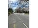 View of the neighborhood street with lush trees, vehicles and homes at 1771 Hosea L Williams Se Dr, Atlanta, GA 30317