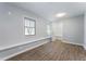 Bedroom with large windows, bright lighting, and walk-in closet at 4833 Chapelle Ct, Marietta, GA 30066