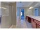 Bathroom showcasing a shower, bath, window, and double sink with vanity at 922 Gardenia Curv, Canton, GA 30114