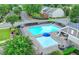 Community pool featuring a mushroom fountain, lounge chairs, and covered seating area at 922 Gardenia Curv, Canton, GA 30114