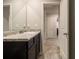 This bathroom features a granite vanity, neutral walls, and luxury vinyl plank flooring at 11930 Guelph Cir, Hampton, GA 30228