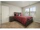 Cozy bedroom with warm carpet and a comfortable bed at 11930 Guelph Cir, Hampton, GA 30228