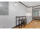 Cozy dining area features wood-look flooring, bar-height table with stools, and white walls at 2776 Grand Sw Ave, Atlanta, GA 30315