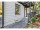 Close-up view of a cozy home's entrance, showcasing its charming front porch and clean design at 2776 Grand Sw Ave, Atlanta, GA 30315
