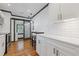 Modern kitchen featuring white cabinets, sleek countertops, and stainless steel appliances at 2776 Grand Sw Ave, Atlanta, GA 30315