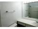 Well-lit bathroom with a large mirror, toilet, and vanity with sink at 5586 Kingsport Dr, Atlanta, GA 30342